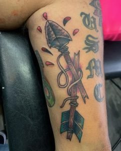 Miss treated Broken Arrow Leg Tattoo 