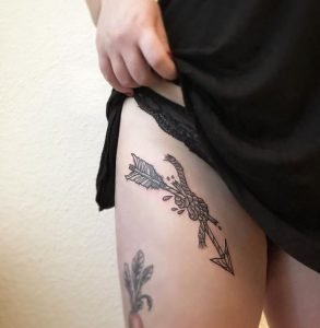 Broken Arrow Thigh Tattoo