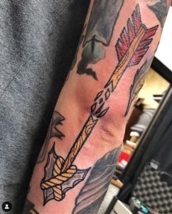 Slip Out Broken Arrow Tattoo