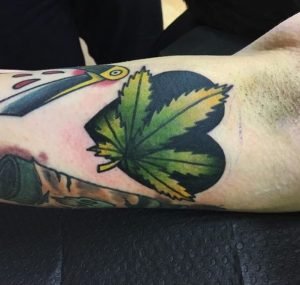 Love Inside Pot Leaf Tattoo