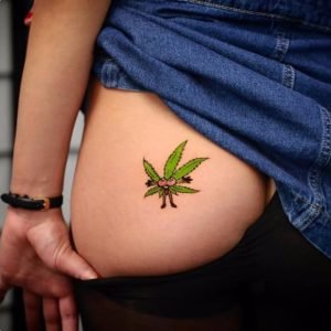 Pot leaf tattoo on butt