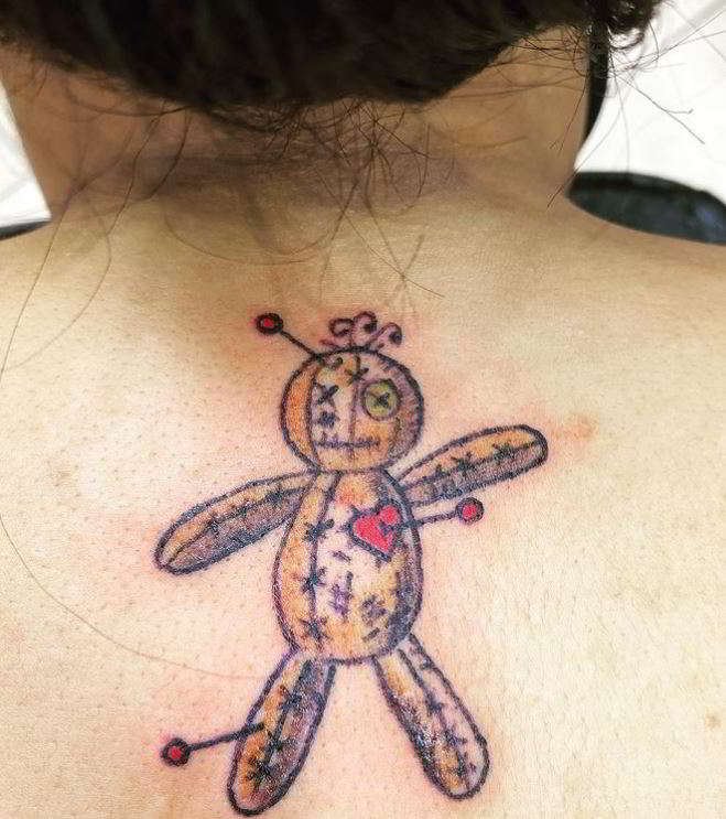 Tiny Voodoo Doll Tattoo